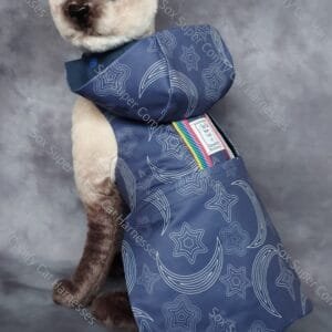 Blue all seasons cat harness with a star and moon pattern. Shown with the bum and hood attachments.