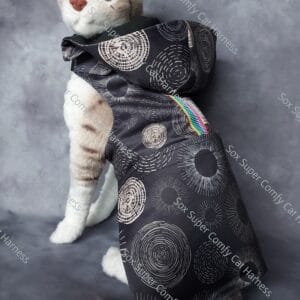 Black all seasons cat harness with a gold pattern. Shown with both the bum and hood attachments.